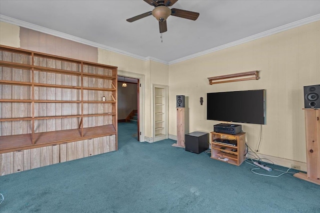 living room featuring ornamental molding, carpet flooring, and ceiling fan