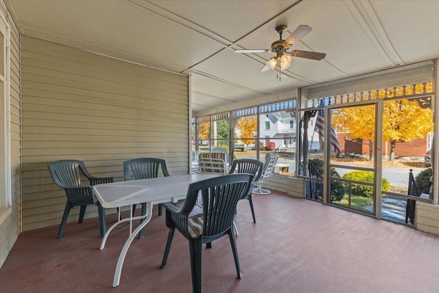 sunroom featuring plenty of natural light and ceiling fan