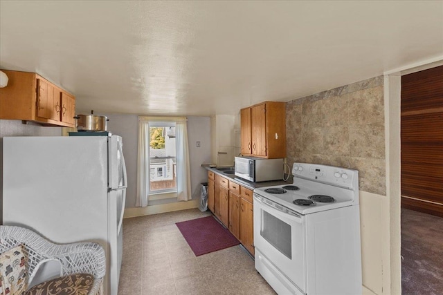 kitchen featuring white appliances