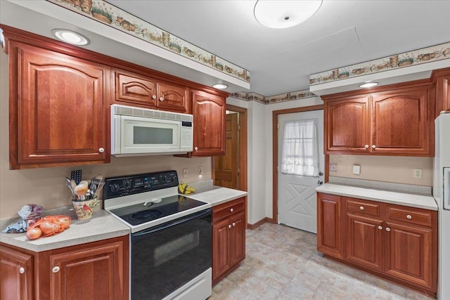 kitchen featuring white appliances