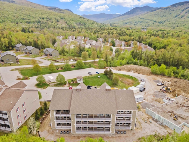 birds eye view of property featuring a mountain view