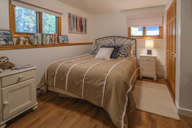 bedroom with light hardwood / wood-style flooring