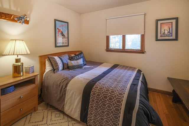 bedroom with wood-type flooring