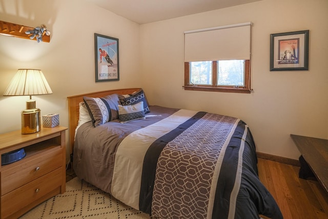 109 Upper Loop, Ludlow, VT 05149 - bedroom featuring wood finished floors and baseboards