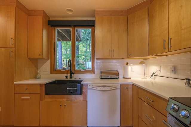 109 Upper Loop, Ludlow, VT 05149 - kitchen with dishwasher, a sink, light countertops, backsplash, and range