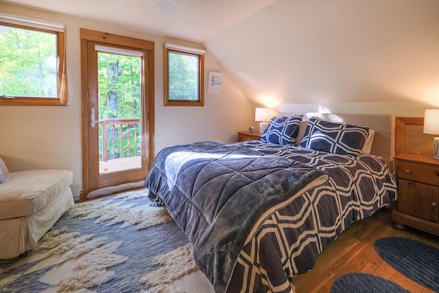 109 Upper Loop, Ludlow, VT 05149 - bedroom with wood-type flooring, access to outside, and vaulted ceiling