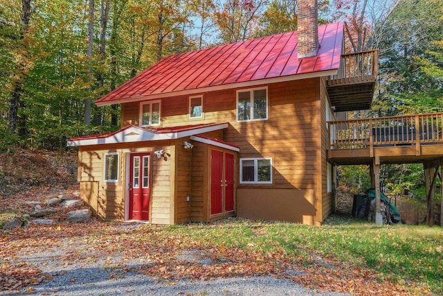 exterior space featuring a wooden deck