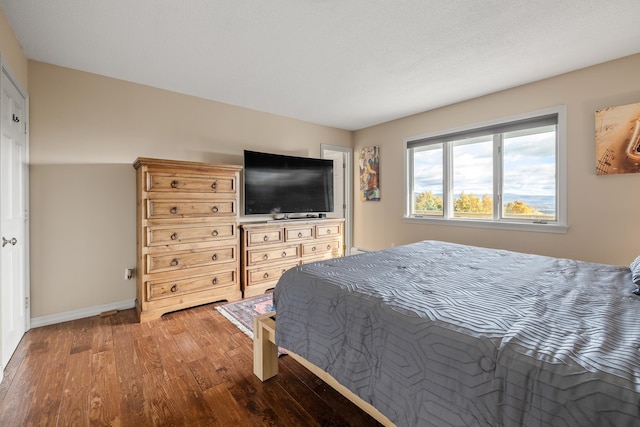 bedroom featuring hardwood / wood-style flooring