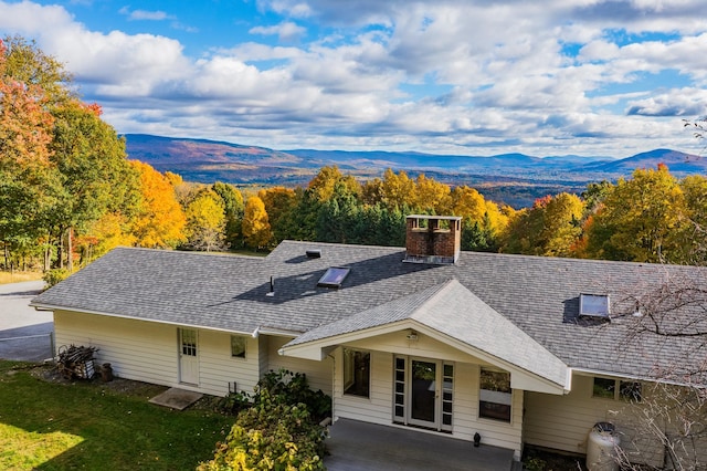 exterior space featuring a mountain view