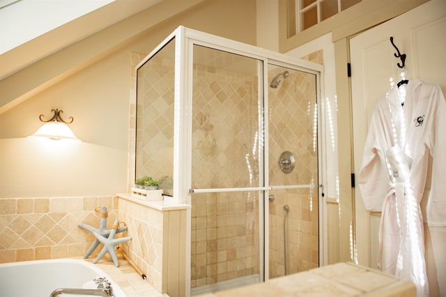 bathroom with separate shower and tub