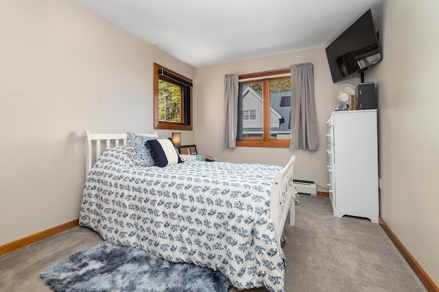 bedroom featuring carpet floors and baseboard heating