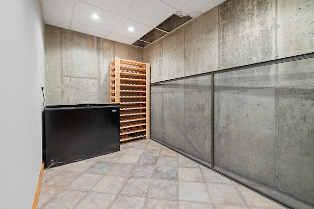 wine cellar featuring a paneled ceiling