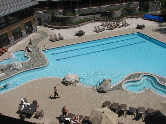 view of pool with a patio