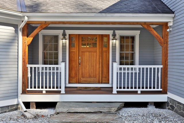 property entrance featuring a porch