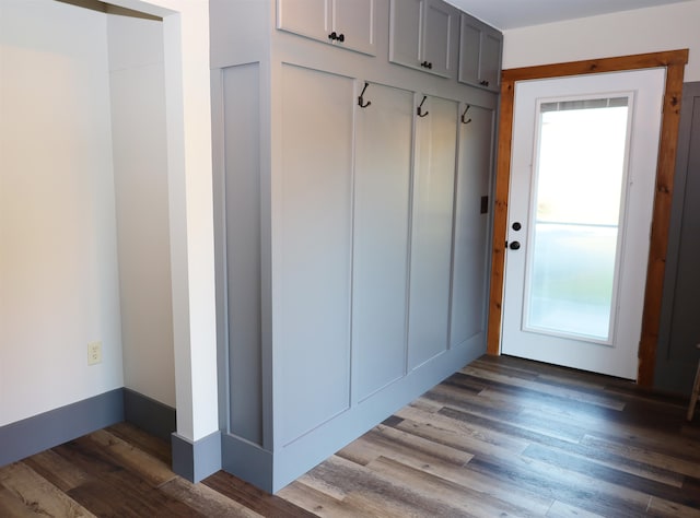 mudroom with dark hardwood / wood-style floors