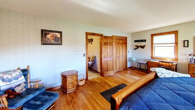 bedroom featuring a closet and hardwood / wood-style flooring