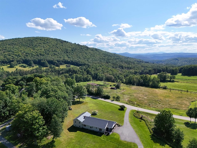 bird's eye view featuring a rural view and a mountain view