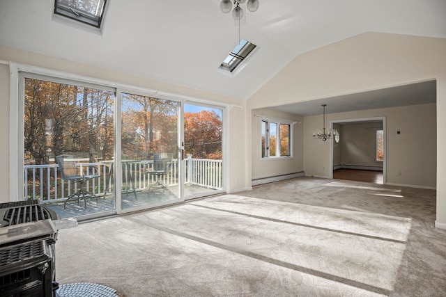 unfurnished sunroom with a baseboard radiator, lofted ceiling with skylight, and an inviting chandelier