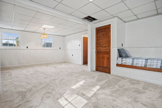 interior space featuring a paneled ceiling