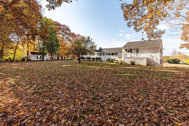 view of yard with a wooden deck