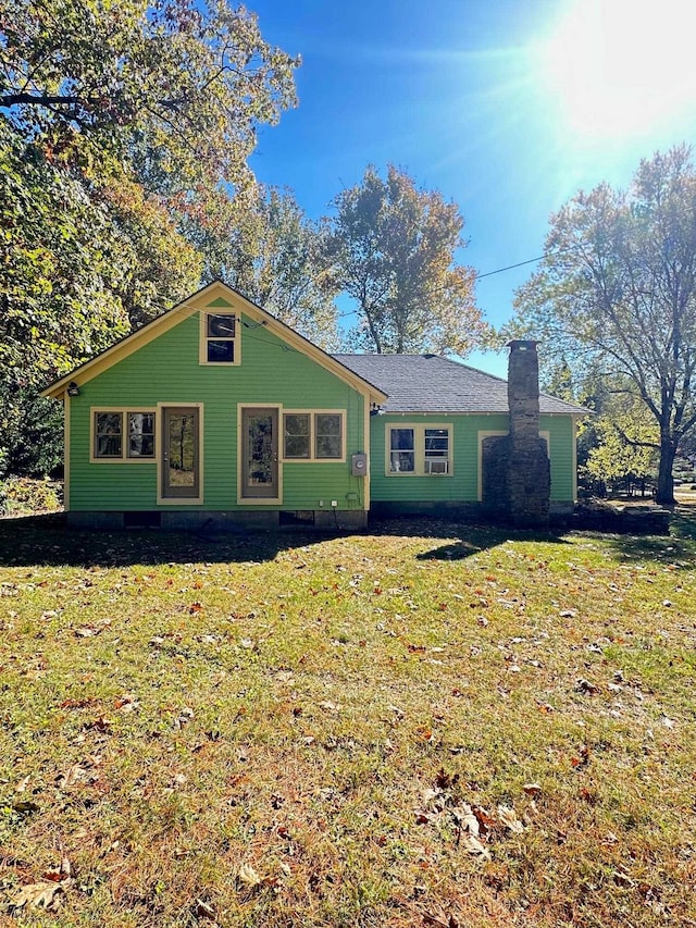 single story home with a front yard