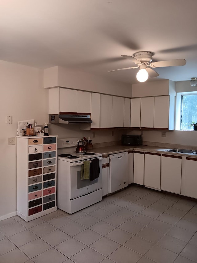 kitchen with sink, white cabinetry, white appliances, and ceiling fan