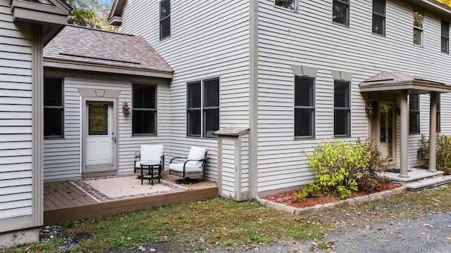 doorway to property featuring a wooden deck