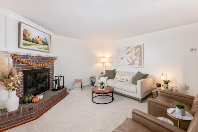 carpeted living room featuring a brick fireplace