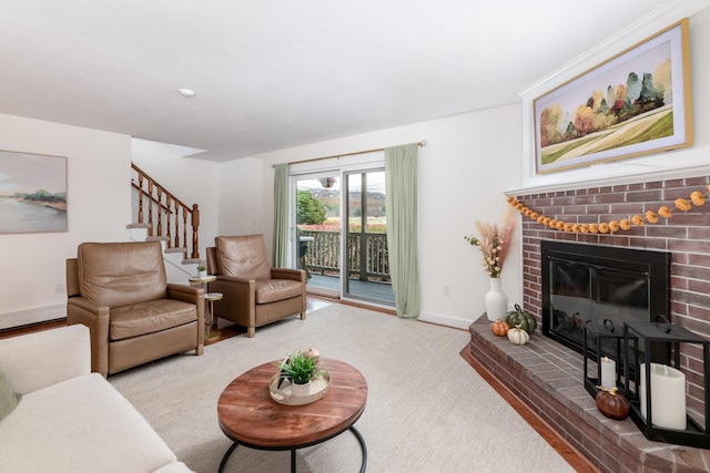 living room featuring a fireplace and light colored carpet