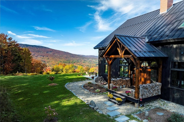 view of yard featuring a gazebo and a mountain view