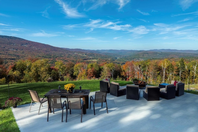 view of patio / terrace with a mountain view