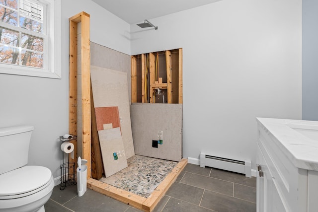 155 E Shore Dr, Weare, NH 03281 - bathroom with baseboard heating, toilet, a shower stall, tile patterned flooring, and vanity