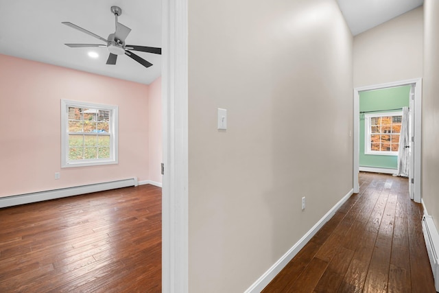 155 E Shore Dr, Weare, NH 03281 - hall featuring dark wood-type flooring, baseboards, a baseboard radiator, and a baseboard heating unit