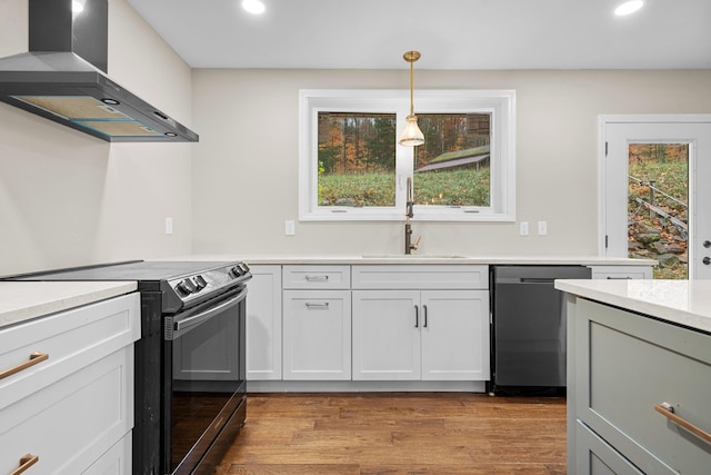 155 E Shore Dr, Weare, NH 03281 - kitchen with black range with electric stovetop, wall chimney range hood, dishwasher, recessed lighting, and a sink