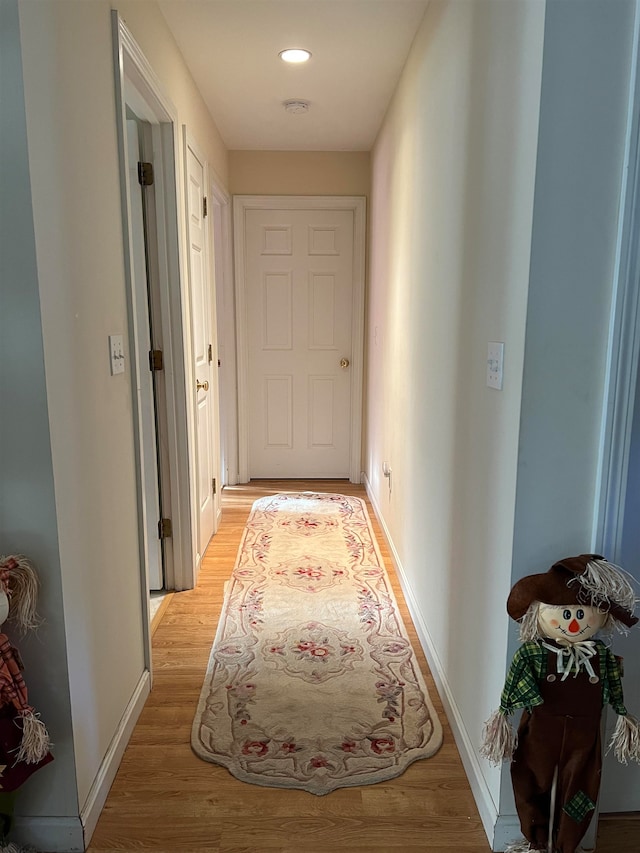 hall featuring light hardwood / wood-style floors