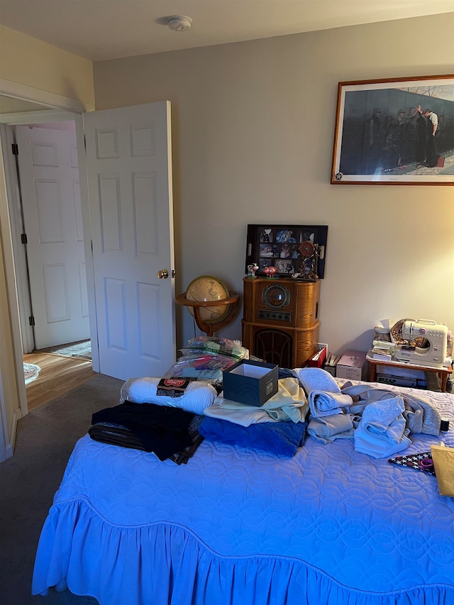 bedroom featuring hardwood / wood-style floors