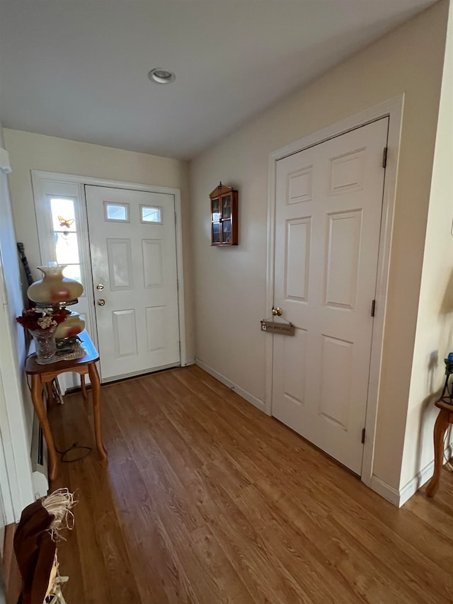 entryway with light hardwood / wood-style flooring