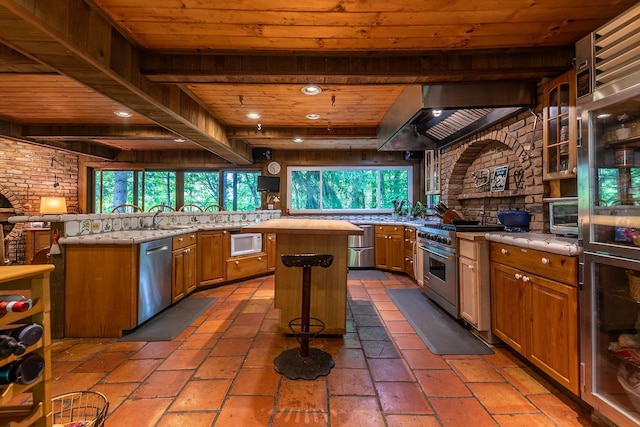 11 Founders Hill Rd, Winhall, VT 05340 - kitchen featuring a wealth of natural light, stainless steel appliances, wall chimney exhaust hood, and wood ceiling
