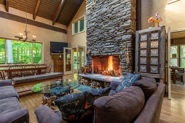 11 Founders Hill Rd, Winhall, VT 05340 - living room with wood ceiling, a chandelier, high vaulted ceiling, hardwood / wood-style flooring, and beam ceiling