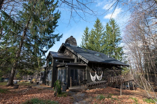 11 Founders Hill Rd, Winhall, VT 05340 - exterior space with a shingled roof, a chimney, and a wooden deck