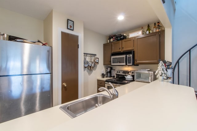 kitchen featuring sink and appliances with stainless steel finishes