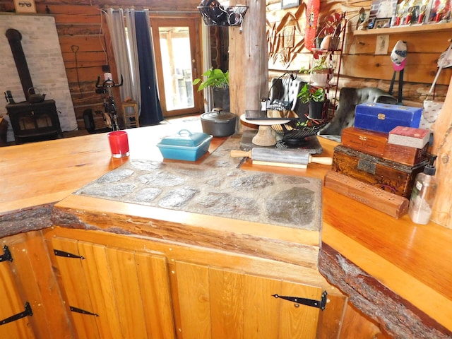 interior details featuring a wood stove