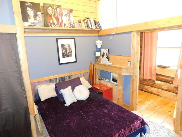 bedroom featuring hardwood / wood-style flooring