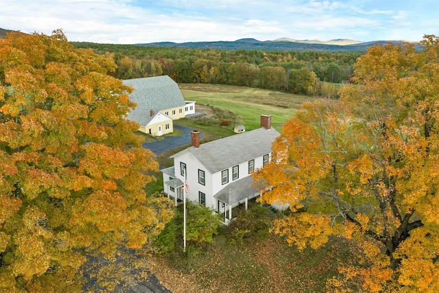 birds eye view of property with a mountain view