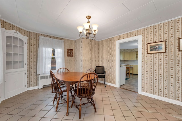 tiled dining room featuring radiator heating unit, a notable chandelier, and crown molding