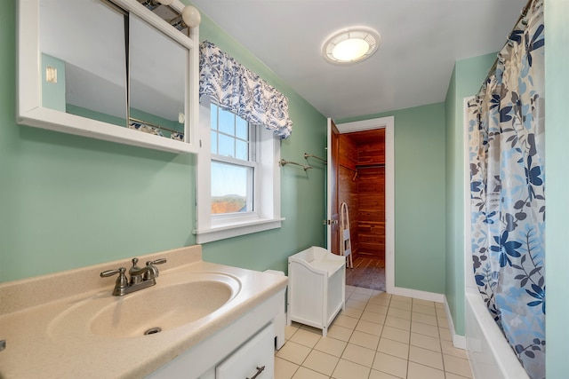 bathroom featuring vanity, tile patterned floors, and shower / tub combo