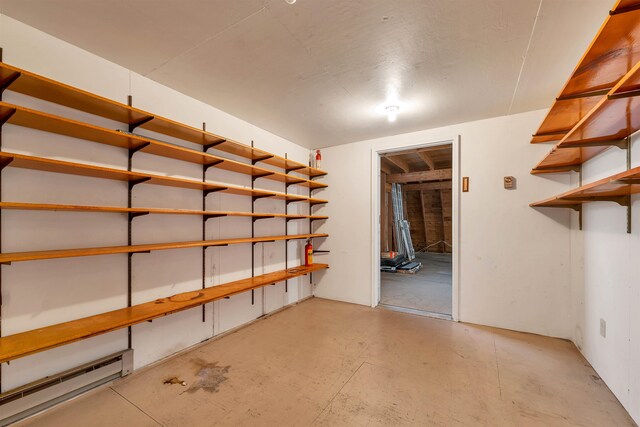 basement featuring a baseboard radiator