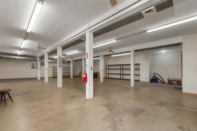 garage featuring ceiling fan