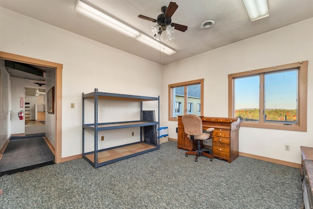 office area featuring ceiling fan and dark colored carpet