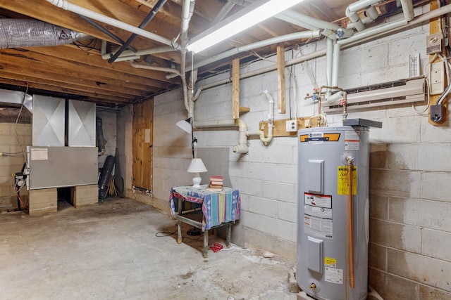 basement featuring electric water heater and heating unit